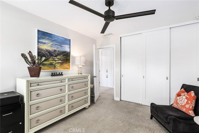 sitting room with light carpet and ceiling fan