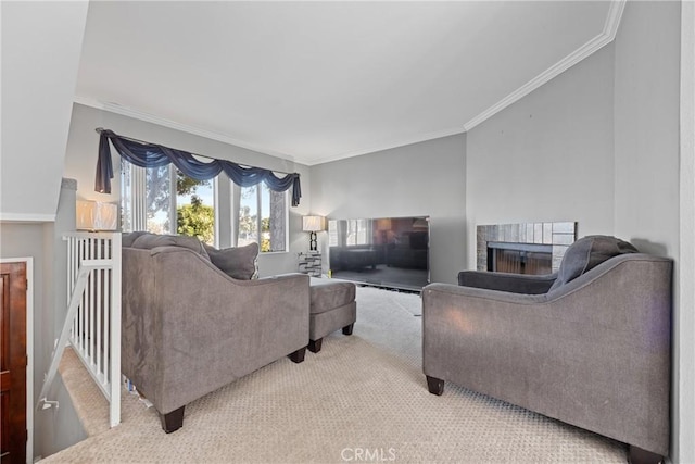 carpeted living room with crown molding and a fireplace