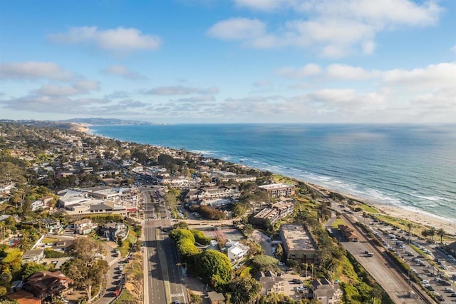 aerial view featuring a water view and a beach view