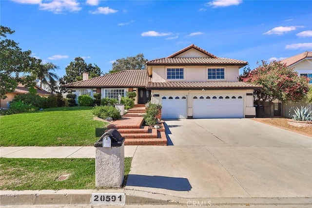 20591 Celtic St, Chatsworth, CA 91311 - view of front facade with concrete driveway, a tile roof, a front yard, an attached garage, and stucco siding