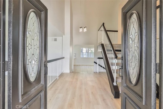 foyer entrance featuring light hardwood / wood-style flooring