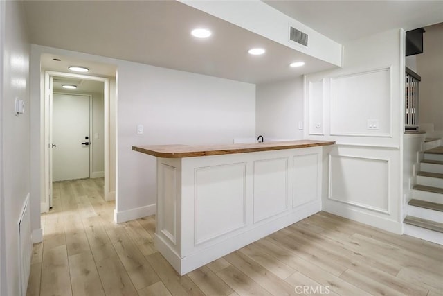 20591 Celtic St, Chatsworth, CA 91311 - bar with recessed lighting, stairs, visible vents, and light wood-type flooring