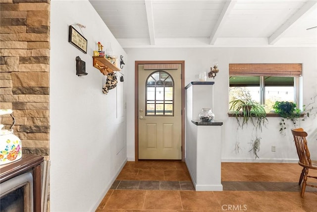 doorway featuring wood ceiling and beamed ceiling