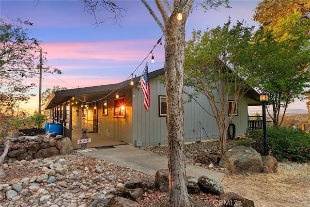 view of property exterior at dusk