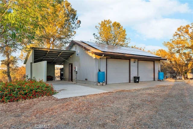 exterior space featuring a carport