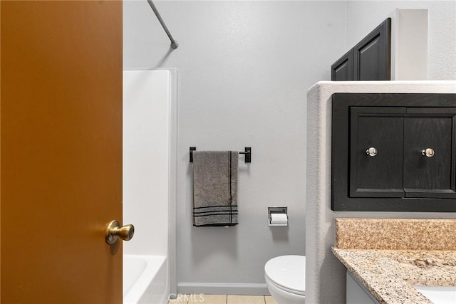 full bathroom with tile patterned floors, toilet, bathing tub / shower combination, and vanity