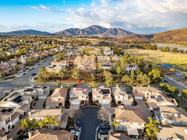 birds eye view of property featuring a mountain view and a residential view