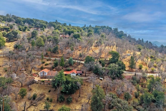 birds eye view of property with a rural view