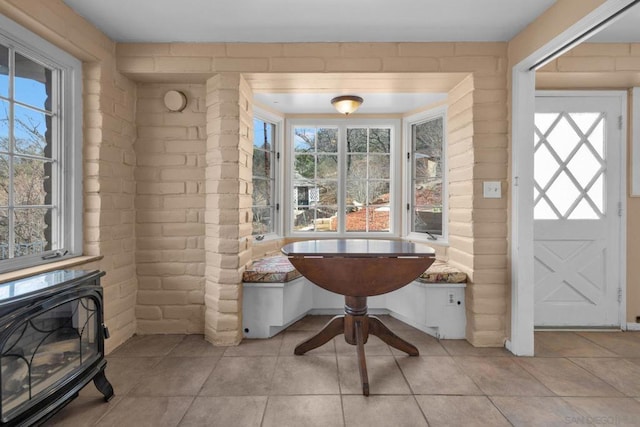 interior space featuring breakfast area and a healthy amount of sunlight