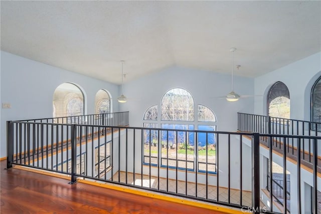 15796 Joseph Trl, Lower Lake, CA 95457 - hallway featuring vaulted ceiling, an upstairs landing, and wood finished floors
