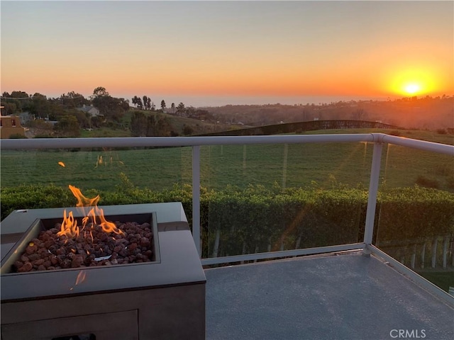 exterior space with a fire pit