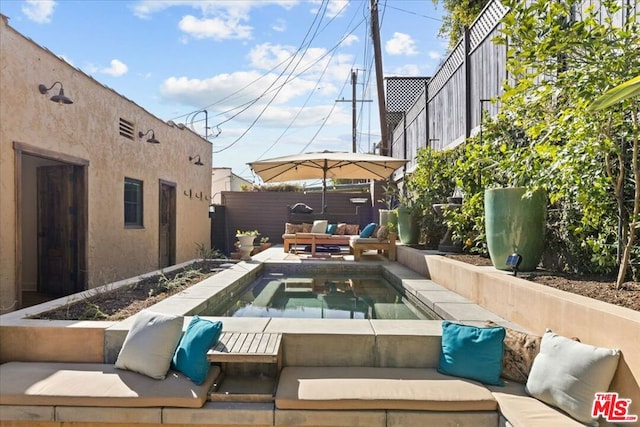 view of pool featuring outdoor lounge area