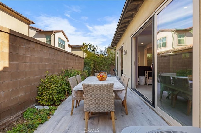 view of patio / terrace featuring a wooden deck