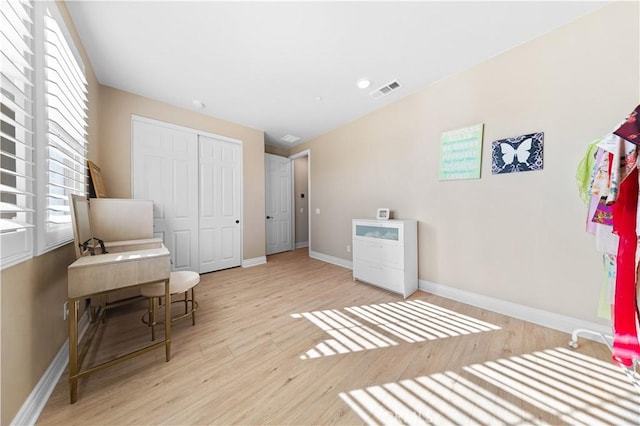 sitting room with light wood-type flooring