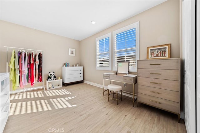 home office featuring light hardwood / wood-style floors