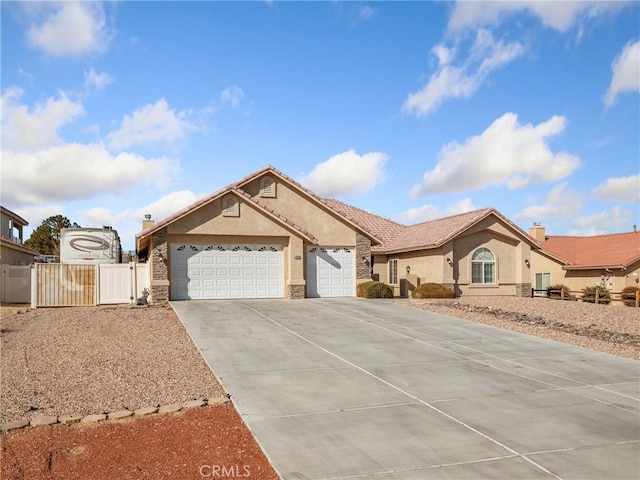 ranch-style home with a garage