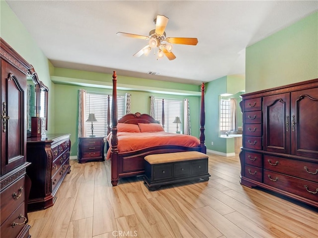 bedroom featuring ceiling fan and light wood-type flooring