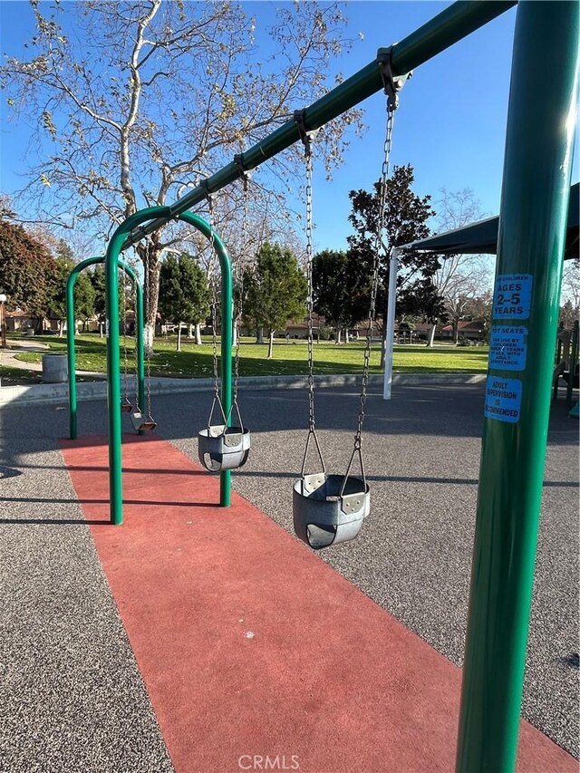 view of home's community with a playground