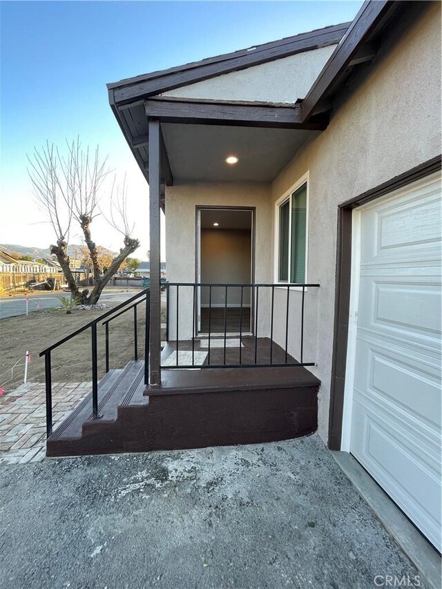 property entrance with a balcony