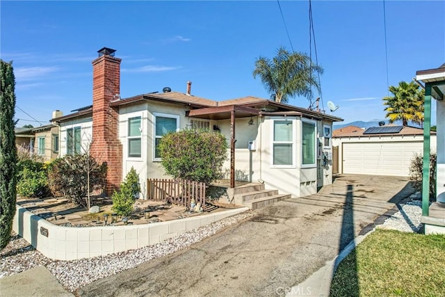 bungalow-style home featuring a garage