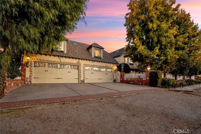 view of front of property featuring a garage