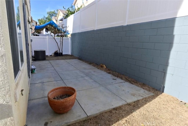 view of patio with central AC