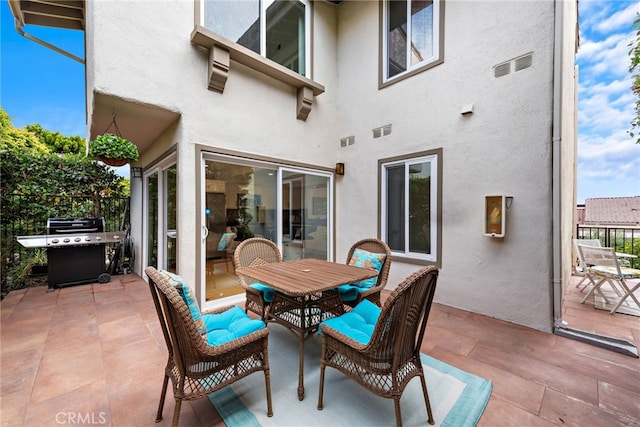 view of patio / terrace featuring a grill