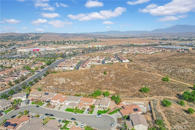 drone / aerial view featuring a mountain view