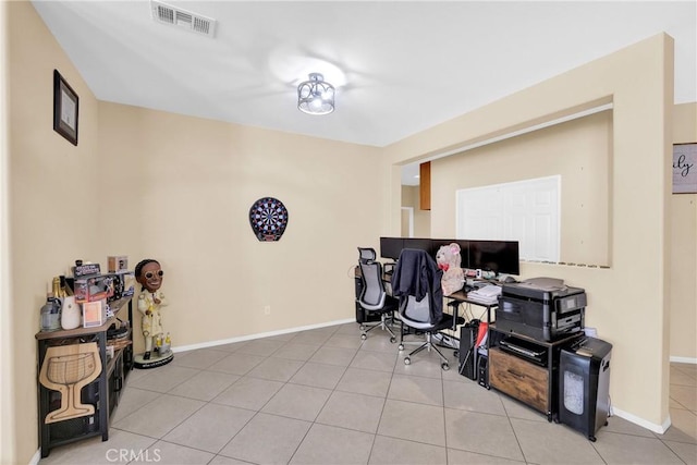 office space with light tile patterned floors