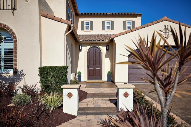 property entrance with a garage