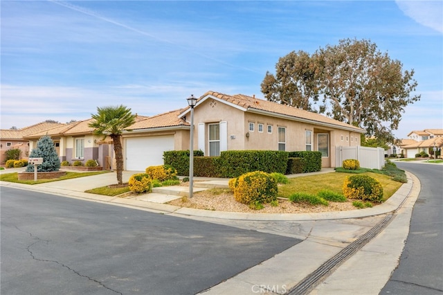 ranch-style home with a garage