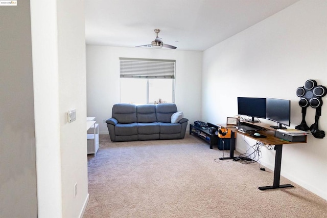 office space with carpet floors and ceiling fan