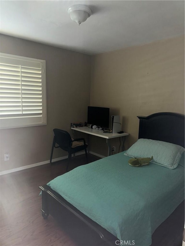 bedroom featuring hardwood / wood-style floors