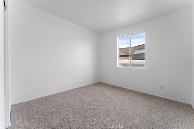 empty room featuring carpet floors