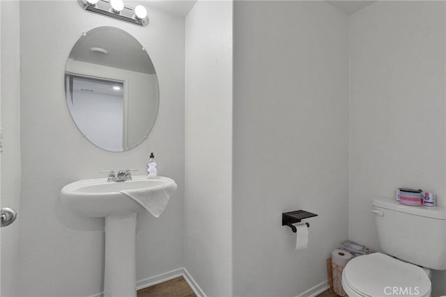 bathroom featuring toilet