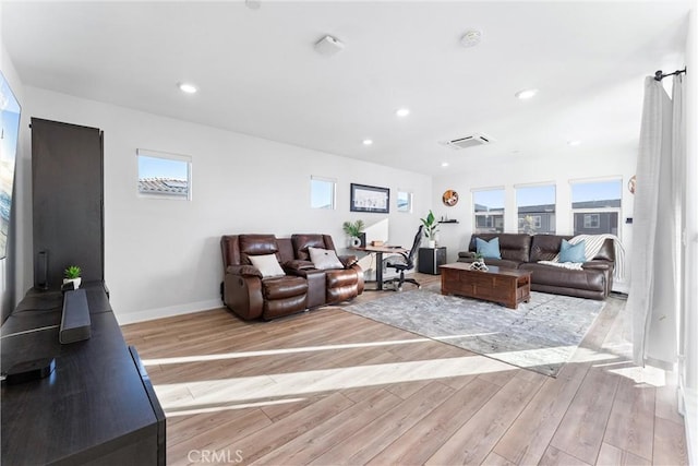 living room featuring light hardwood / wood-style floors