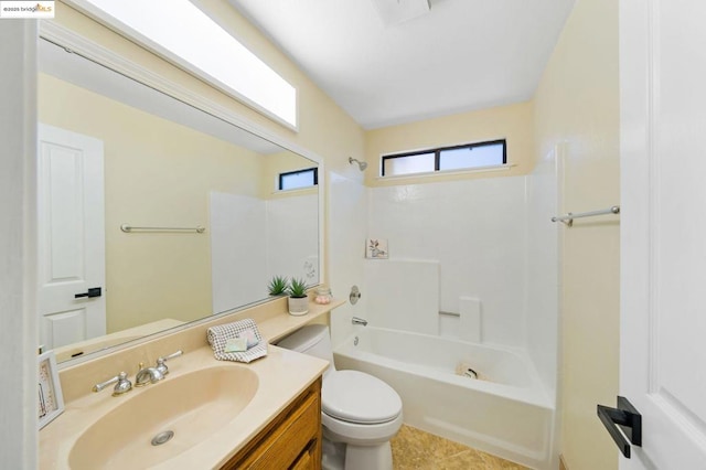 full bathroom featuring bathing tub / shower combination, vanity, tile patterned floors, and toilet