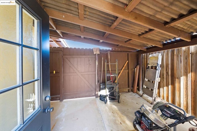 interior space featuring wooden walls