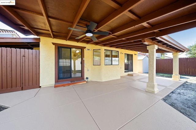 view of patio featuring radiator heating unit and ceiling fan