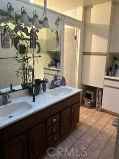 bathroom with sink and tile patterned floors