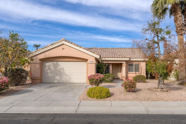 single story home with a garage