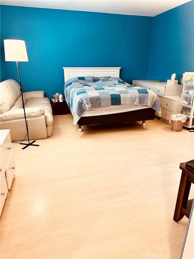 bedroom featuring light hardwood / wood-style flooring