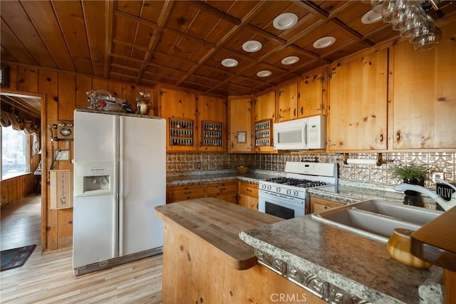 kitchen featuring sink, coffered ceiling, wood ceiling, light hardwood / wood-style floors, and white appliances