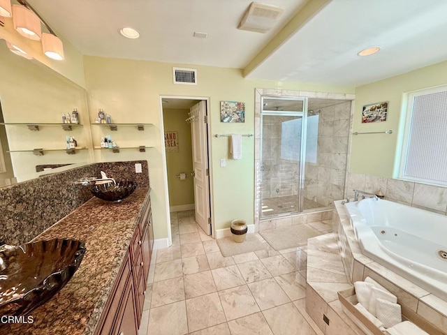 bathroom featuring vanity and plus walk in shower