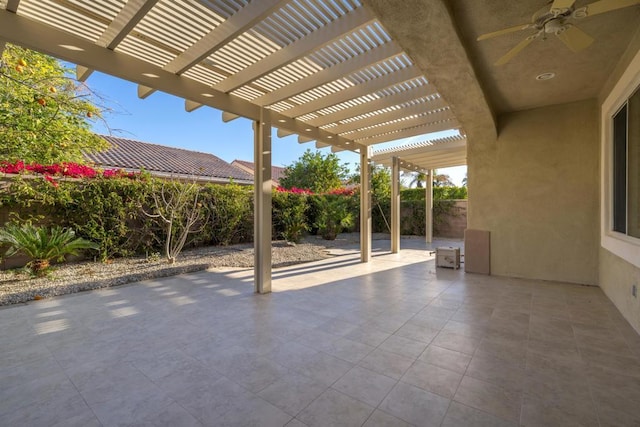 view of patio featuring ceiling fan and a pergola