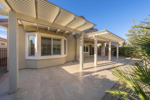 view of patio / terrace featuring a pergola