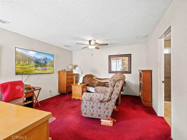 bedroom with dark carpet, a textured ceiling, and ceiling fan