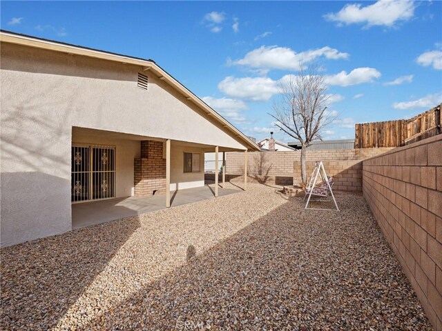 view of yard featuring a patio