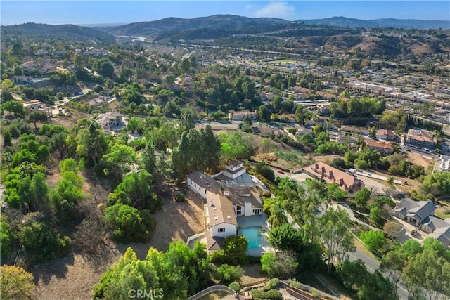 drone / aerial view featuring a mountain view