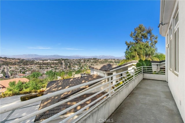 balcony featuring a mountain view